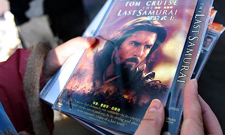 A pirated DVD Big drain  a pirated DVD. Photograph: AP