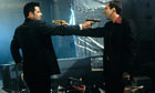 John Travolta and Nicolas Cage in Face/Off (1997)