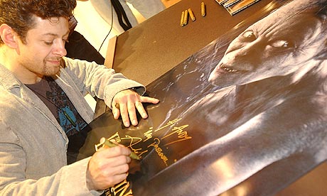 Andy Serkis signing a Lord of the Rings poster