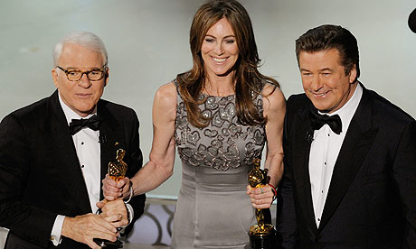 Kathryn Bigelow is flanked by Steve Martin and Alec Baldwin after winning best picture Oscar