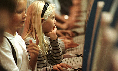 Two girls surfing the internet