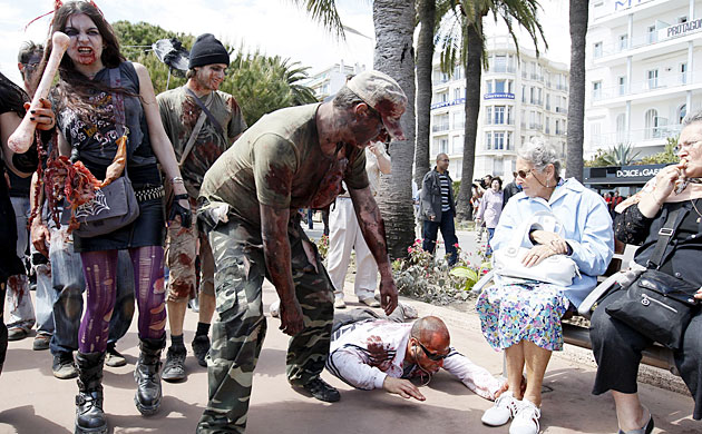 Cannes film festival day6: People dressed as zombies walk in Cannes to promote the Bloody Week-End