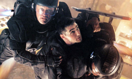 Tom Cruise, centre, in Steven Spielberg's 2002 adaptation of Philip K Dick's Minority Report.