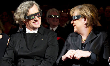 Wim Wenders and German Chancellor Angela Merkel at the Pina 3D premiere at the Berlin film festival