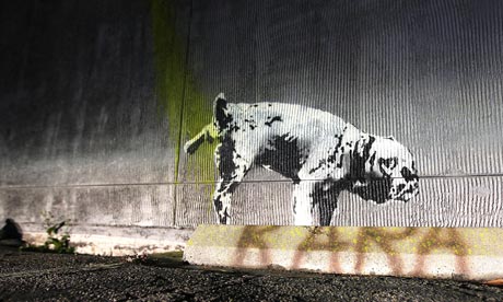 Piss artist ... a urinating dog, stencilled on an LA wall by Banksy ahead of Sunday night's Oscars.