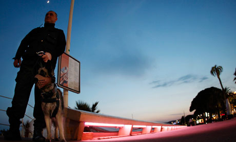 Cannes 2011: a security officer by the Carlton hotel beach