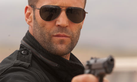 Jason Statham in Killer Elite aviators plus gun