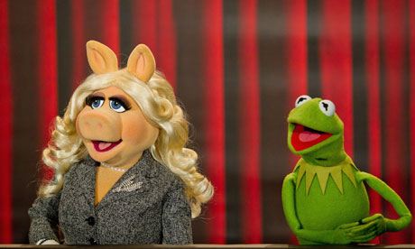 As green on screen … Miss Piggy and Kermit at a photo call for The Muppets in Germany last week.