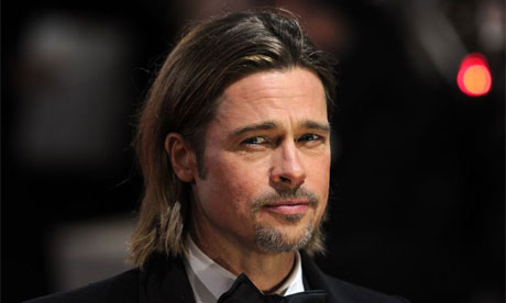Baftas 2012 Brad Pitt arrives on the red carpet How about that kiss