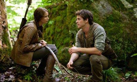 Katniss Everdeen Jennifer Lawrence and Gale Hawthorne Liam Hemsworth in 