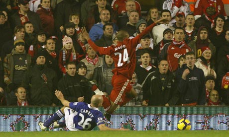 David Ngog goes down under a challenge from Lee Carsley