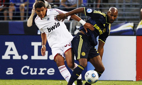 AC Milan's Nicola Pasini battles Chelsea's Nicolas Anelka