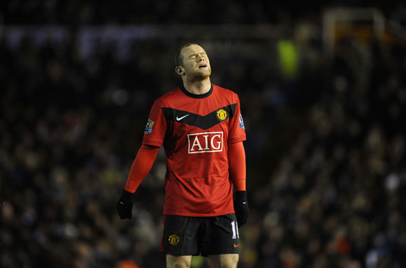Birmingham: Wayne Rooney looks frustrated as United miss another chance