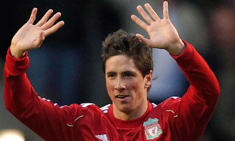 Fernando Torres celebrates after scoring his second goal against Chelsea 