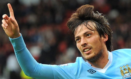 David Silva celebrates Manchester City's fifth goal in the 6-1 win over Manchester United
