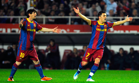 Lionel Messi and David Villa appeal against a decision in Barcelona's draw with Sevilla