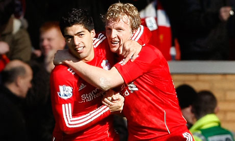 Liverpool's Dirk Kuyt celebrates with Luis Suárez after scoring against Manchester United at Anfield