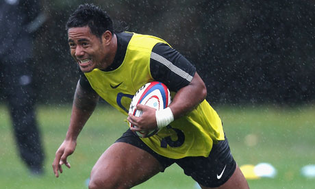 Manu Tuilagi trains in the rain during preparations for England's World Cup
