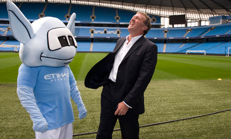 Garry Cook, Manchester City's chief executive, has denied sending an offensive email