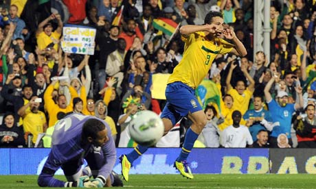 Brazil s Leandro Damaio celebrates his goal against Ghana in