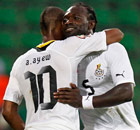 Ghana's Andre Ayew and John Mensah