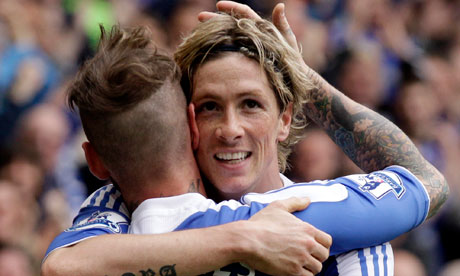 Meireles congratulates Torres on a job well done