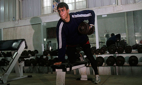 Palestinian athlete Bahaa al-Farra trains at a gym in Gaza City