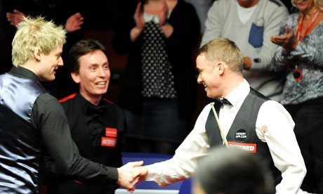 Stephen Hendry is congratulated by Ken Doherty and Neil Robertson after he