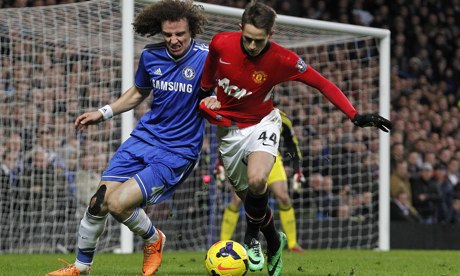 David Luiz, left, challenges Manchester United's Adnan Januzaj, who caused Chelsea problems