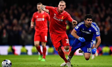 Chelsea's Diego Costa is brought down by Liverpool's Martin Skrtel in the Capital One Cup semi-final