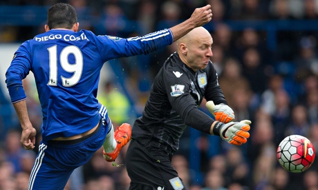 Aston Villa's Brad Guzan reaches the ball ahead of Chelsea's Diego Costa at Stamford Bridge