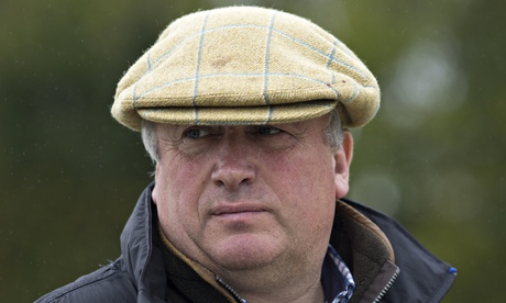 Multiple Champion National Hunt trainer oversees morning work at his stables at Ditcheat in Somerset