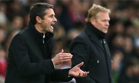 Aston Villa's manager Remi Garde and the Southampton manager, Ronald Koeman