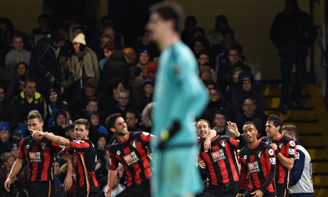 Bournemouth celebrate Glenn Murray's goal as Chelsea's Thibaut Courtois looks dejected