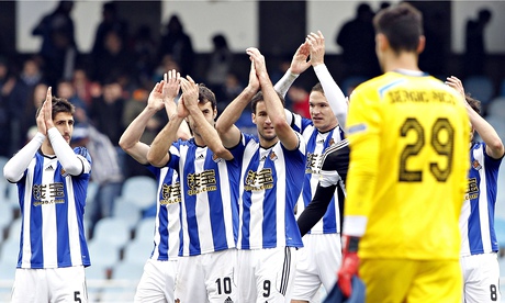 The Real Sociedad players celebrate their 4-3 victory over Sevilla in La Liga