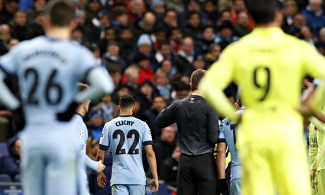 Manchester City's Gael Clichy leaves the pitch after being shown a red card against Barcelona