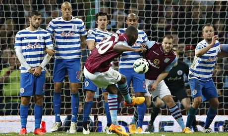 Aston Villa's Christian Benteke scores his third goal in the Premier League match against QPR