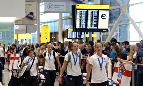 The England team arrive at Heathrow after the third-place finish at the Women's World Cup in Canada