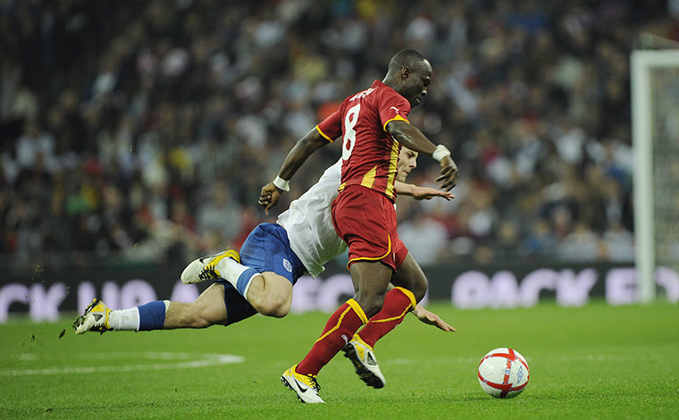 England v Ghana: Jack Wilshere is shoved off the ball by Agyemang-Badu