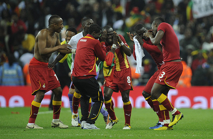 England v Ghana: Ghana team-mates dance as they celebrate after the final whistle