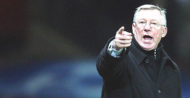 Sir Alex Ferguson gestures to his players