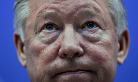 Manchester United coach Alex Ferguson attends a press conference in Barcelona, Spain