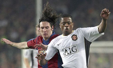 Lionel Messi and Patrice Evra