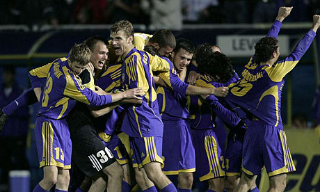 BATE Borisov players celebrate reaching the Champions League group stage