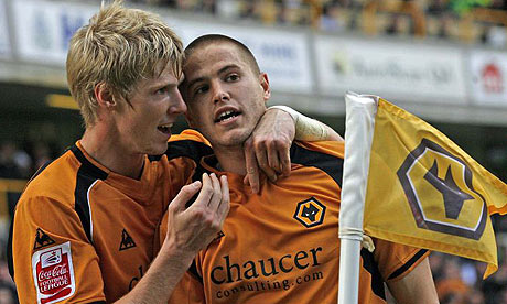 Michael Kightly celebrates alongside Andy Keogh after scoring for Wolves against Coventry
