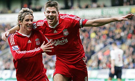 Liverpool midfielder Steven Gerrard celebrates with  Fernando Torres at Bolton.