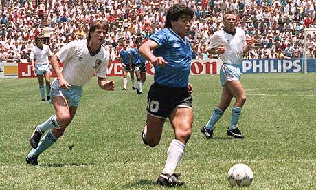 Diego Maradona leaves Terry Butcher and Terry Fenwick in his wake