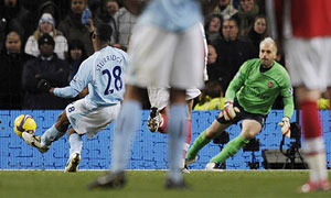 Daniel Sturridge scores for Manchester City against Arsenal