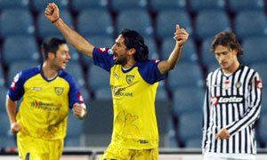 Chievo's Mario Alberto Yepes celebrates after Udinese score an own goal