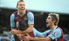 Craig Bellamy celebrates with his West Ham team-mates after scoring against Portsmouth
